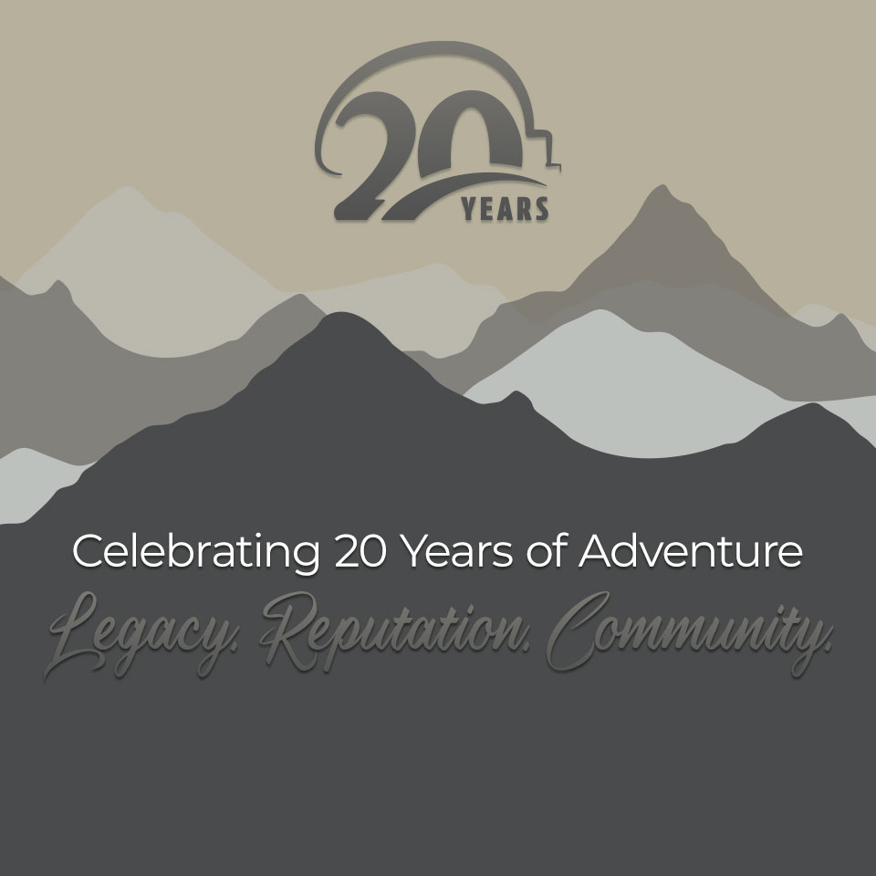 20 Years of Adventure graphic with stylized mountain silhouettes in shades of gray and beige in the background